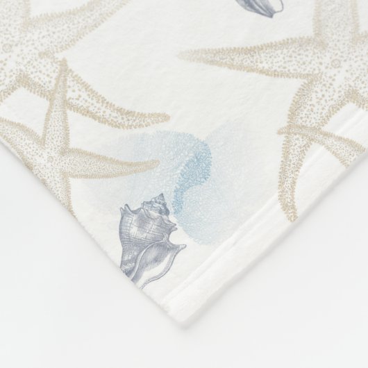 ヒトデは白く青いビーチのフリースブランケットを殻から取り出します フリースブランケット (角)