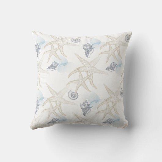 ヒトデは白く青いビーチの装飾用クッションを殻から取り出します クッション (裏面)