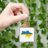 ヒマワリとウクライナ国旗を持つウクライナの地図 キーホルダー (手)