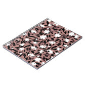 ヒョウの背景の花のパターン。 ノートブック (左側)