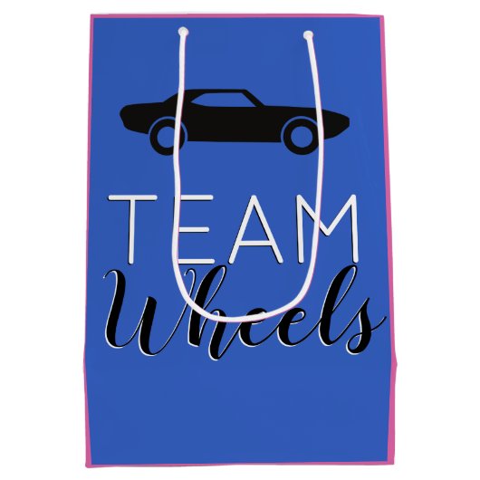 ヒールまたはホイールチームのピンク|青い性別の表示 ミディアムペーパーバッグ (裏面)