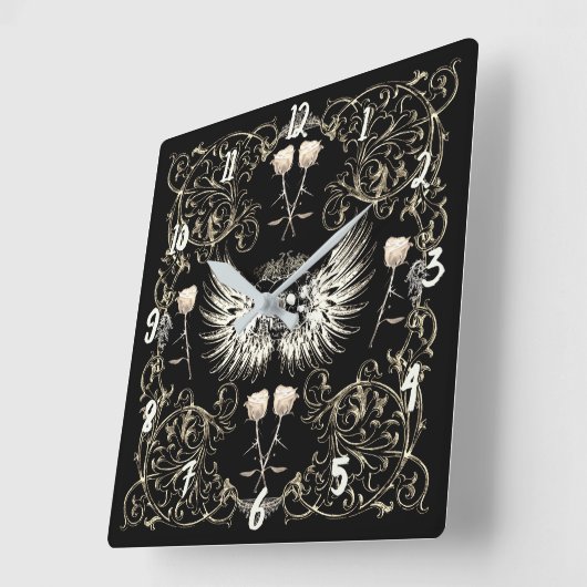 ビクトリアンなゴシック様式ロマンスのスカルの翼及び白いバラ スクエア壁時計 (傾斜)