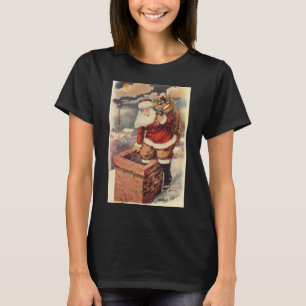 ビクトリア時代のクリスマス ヴィンテージサンタクロースが煙突を降りる Tシャツ