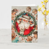 ビクトリア時代のサンタクロースが子供たちと電話で会話中 カード (黄色い花)