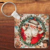 ビクトリア時代のサンタクロースが子供たちと電話で話す キーホルダー (正面)