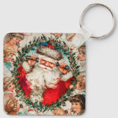 ビクトリア時代のサンタクロースが子供たちと電話で話す キーホルダー (裏面)