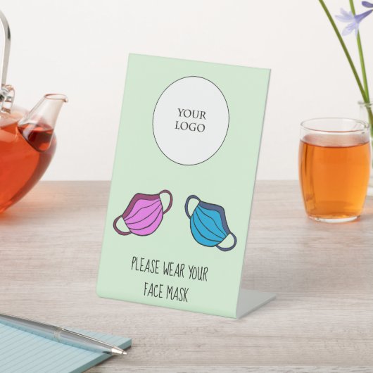ビジネスロゴを使用して顔マスクを衣服する 台座サイン (インサイチュ)