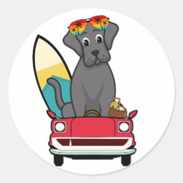 ビッおもしろいク・ブラック・ドッグがビーチに向かう ラウンドシール