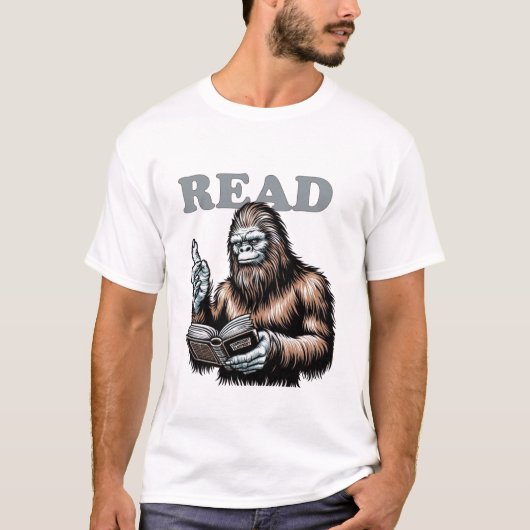 ビッグフットが読むことについて Tシャツ (正面)