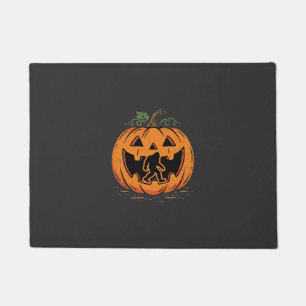 ビッグフットのハロウィン・パンプキン・シルエットデザイン_1 ドアマット