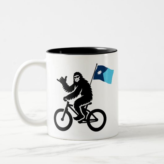 ビッグフットサイクリングミネソタ国旗 ツートーンマグカップ (左)