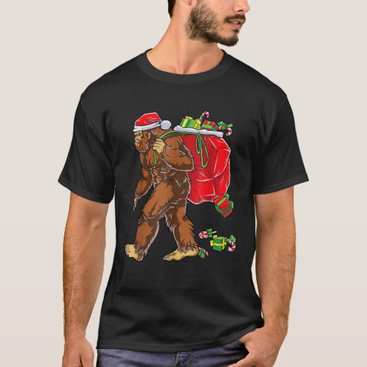 ビッグフットサンタクリスマスツリーライトおもしろいクリスマスSas Tシャツ (正面)