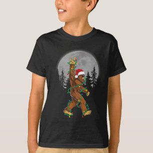 ビッグフットサンタクリスマスツリーライトおもしろいクリスマスSas Tシャツ