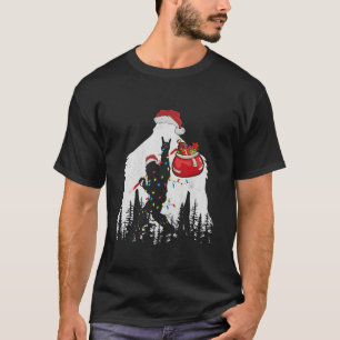 ビッグフットサンタクリスマスツリーライトおもしろいクリスマスSas Tシャツ
