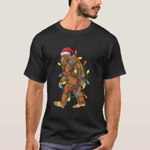 ビッグフットサンタクリスマスツリーライトおもしろいクリスマスSas Tシャツ