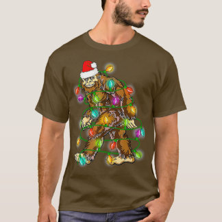 ビッグフートサンタクリスマスツリーライトクリスマス Tシャツ