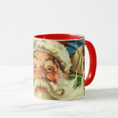 ビンテージクリスマスのサンタクロースが玩具を積んだソリに乗る マグカップ (正面右)