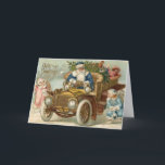 ビンテージクリスマスカード | Santa vintage car Cherubs シーズンカード<br><div class="desc">ヴィンテージビクトリアンクリスマスカードは必ずギグとスマイル。これらのビクトリアンスタイルのクリスマスグリーティング与えカードは、19世紀のクリスマスの魅力とホリビクトリアンデイの願いしゃれているにアンティークの時代を持つことができる。車を愛するすべての人のための自動車テーマ付きのヴィンテージ車のクリスマスカードも2つの可愛い救済cherubsのサンタクロース。</div>