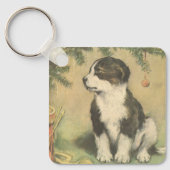 ビンテージクリスマス かわいい子犬がクリスマスツリーの下に キーホルダー (正面)