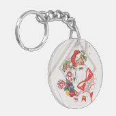 ビンテージクリスマス、キャンディーケーンを持つサンタクロース キーホルダー (正面左)