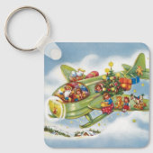 ビンテージクリスマス、サンタクロースが飛行機を飛ばす キーホルダー (正面)