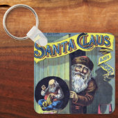 ビンテージクリスマス、サンタクロースと彼の作品の本 キーホルダー (正面)