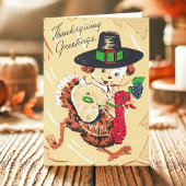 ビンテージ子犬が七面鳥に乗って感謝祭を楽しむ シーズンカード