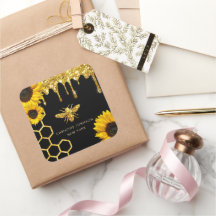 ビーのロゴとヒマワリ