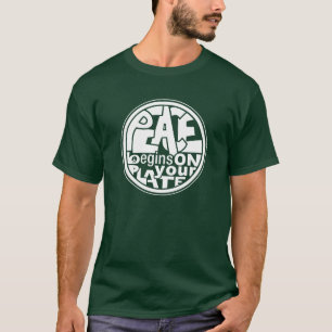 ビーガンのスローガンの平和はあなたのプレートで始まります Tシャツ