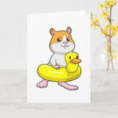 ビーチでダックを浮き輪に抱えたハムスター カード (黄色い花)
