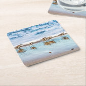 ビーチに沿って走っているシギ スクエアペーパーコースター (アングル)