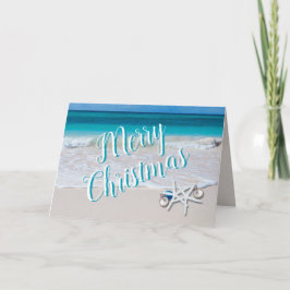 ビーチのクリスマスツリーと星型の魚のクリスマスカード カード
