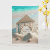 ビーチの砂浜に置かれた結婚お祝い文房具 カード (黄色い花)