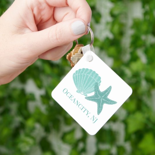 ビーチシェルカスタムズAirbnbバケーションレンタル キーホルダー (手)