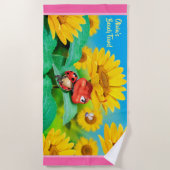 ビーチタオルが眠いラディバグのひまわり。ピンク色の縁 ビーチタオル (正面)