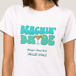 ビーチバチェロレッテグルーヴィビーチインブライド Tシャツ<br><div class="desc">このビーチのバチェロレッテTシャツで今後のバチェロレッテ素晴らしにスプラッシュパーソナライズされたを作ろう。あなたは祝はバッハ旅行でも、女子の休暇でも、友達の休日でも最高の、このビーチのバチェロレッテのTシャツはあなたの忘れられない休暇に完璧に追加されカスタムる。文字オプションを使用して、バチェロレッテの服装に個人touchを追加する。お想像スポーツの客様の特別なイベントを記念して独自にデザインされた上品なtシャツグルーヴとレトロなデザインは、シックでタイムレスな外観を保証し、ビーチの思い出が消えた後に長い時間を大切にする。レトロなデザインのエッセンスを取り込み、服の心地よいを楽モダンしむ。このヴィンテージインスパイアシャツは両方の世界を楽に最高の混合させる。太陽に浸されたビーチからナイトライフまで鮮やか、これらのシャツはスタイルと心地よいの典型である。理想的なバチェロレッテを探す？もう見ろ！このカスタムTシャツはスタイルで分隊を団結させるだけでなく、忘れられないパーティーの好意と同じくらい二重に。あなたの女の子はあなたのビーチのバチェロレッテ冒険からこれらの記念品を崇拝し、笑いの思い出を思い出させ、結合、そして無限のおもしろいを共有した。あなたは波や踊りでカクテルを飲むかどうかは遠くに、このカスタムTシャツは、あなたのバチェロレッテの贅沢のあらゆる瞬間のための完璧なアンサンブルである。touchパーソナライズされたとシックなデザインは、忘れられない旅の本質を捉えるInstagramの価値のある写真のために作る。このビーチバチェロレッテTシャツで頭を回し、永続的な思い出を作るカスタム準備をしなさい。詳細を通して個性を輝かせパーソナライズされた、レトロなビーチサイドのお祝いの魔法に楽しめインスパイアる。今すぐ買い物し、あなたのバチェロレッテを覚えるイベントにする！</div>