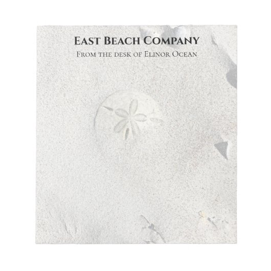 ビーチ砂ドルの背景空白の ノートパッド (正面)
