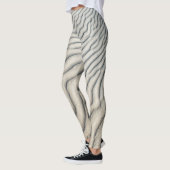 ビーチ砂 レギンス (左)