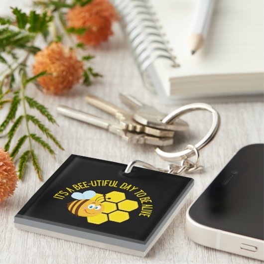 ビー救ツBEEスローガン引用文認識度ギフト キーホルダー (正面右)