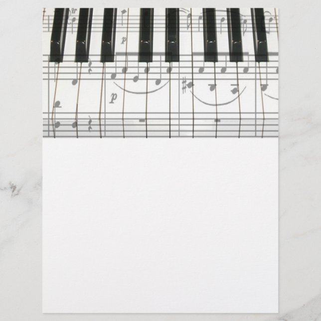 ピアノのキーボードと音楽ノート (正面)