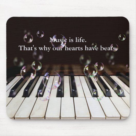 ピアノのキーボード上のバブルと引用文の抄紙 マウスパッド (正面)