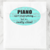 ピアノは全てではないオーバルステッカー 楕円形シール (バッグ)