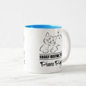 ピアノ奏者に気紛れしやすい不思議な猫 ツートーンマグカップ (正面右)