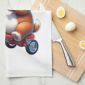 ピザを食べながら自転車に乗る子犬 キッチンタオル (四つ折り)