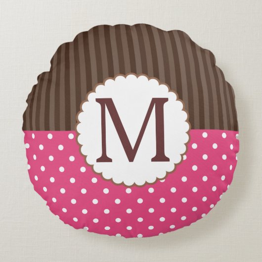 ピンクおよびブラウンの水玉模様のストライプなモノグラム ラウンドクッション (正面)