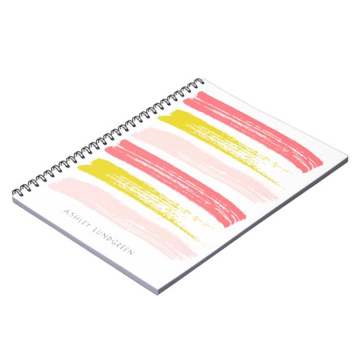 ピンクおよび黄色い水彩画のブラシはカスタムをなでます ノートブック (左側)