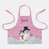 ピンクかわいらしのクリスマス雪だるまパーソナライズされたキッズ エプロン (正面)