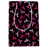 ピンクかわいらしの乳数々のがんリボンパターン ミディアムペーパーバッグ (正面)