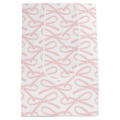 ピンクかわいらしの弓パターン白い中抱き枕 ミディアムペーパーバッグ (裏面)