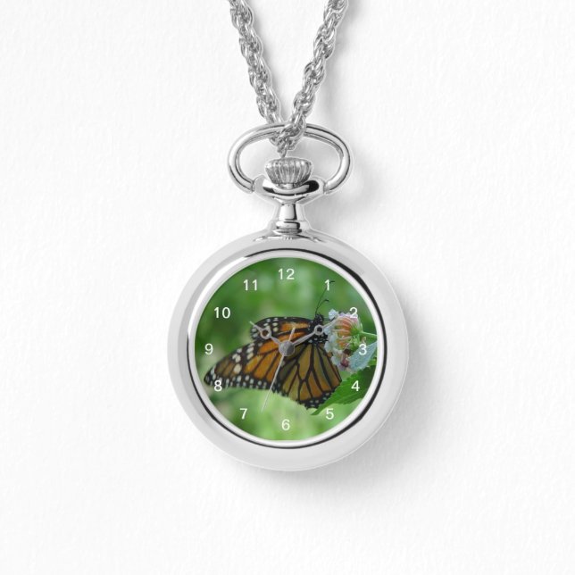 ピンクかわいらしの花に羽ばたき（昆虫）オオカバマダラ、モナーク蝶 腕時計 (正面)